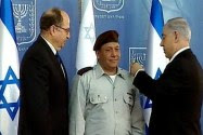 Prime Minister Netanyahu places the medal of Lt. General on new IDF Chief of Staff Gadi Eizenkot as Defense Minister Moshe Ya'alon looks on. The 3 condemned the soldier in Hevron BEFORE any investigation
