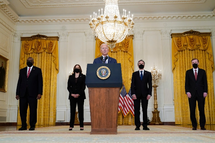 President Joe Biden speaks at the White House. From left, Secretary of Defense Lloyd Austin, Vice President Kamala Harris, Biden, Secretary of State Antony Blinken and White House national security adviser Jake Sullivan.