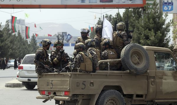 Taliban special force fighters arrive inside the Hamid Karzai International Airport after the U.S. military&#39;s withdrawal, in Kabul, Afghanistan, Tuesday, Aug. 31, 2021. The Taliban were in full control of Kabul&#39;s international airport on Tuesday, after the last U.S. plane left its runway, marking the end of America&#39;s longest war. (AP Photo/Khwaja Tawfiq Sediqi)