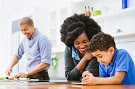 Dad-cooking-while-mom-helps-son-with-homework.jpg