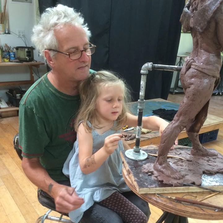 Michael Magrath and his daughter Maggie at work in the Vashon Studio