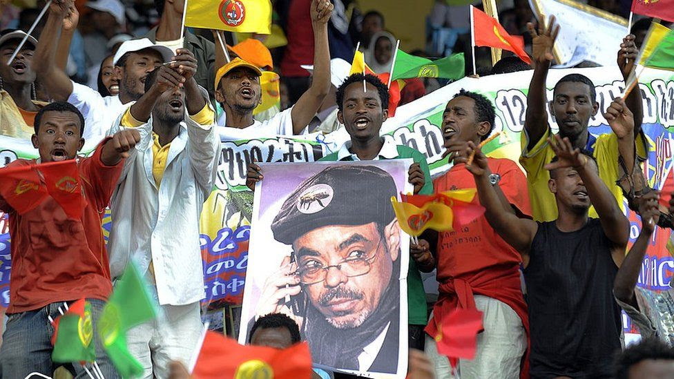 Supporters of Ethiopia's People Revolutionary Front (EPRDF) carry a poster of Prime Minister Meles Zenawi on May 20 2010, on the last day of campaigning ahead of the election scheduled for this weekend