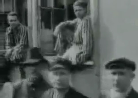 Detainees in the concentration camp of                         Dachau 01 sitting in the window (30min. 30sec.)