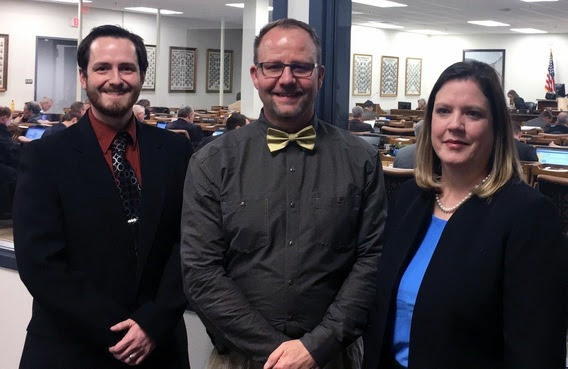 Three teachers, who are candidates for the Presidential Awards for Excellence in Math and Science Teaching, stand in the gallery of the Wyoming House at the Jonah Business Center.
