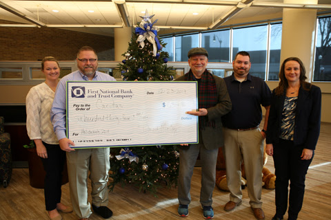 Holidazzle Check presentation to Caritas 2019