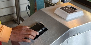 Photo of phone being scanned at new turnstiles at Port Townsend terminal