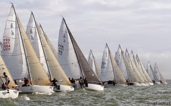 J/80s sailing off start line- La Rochelle, France