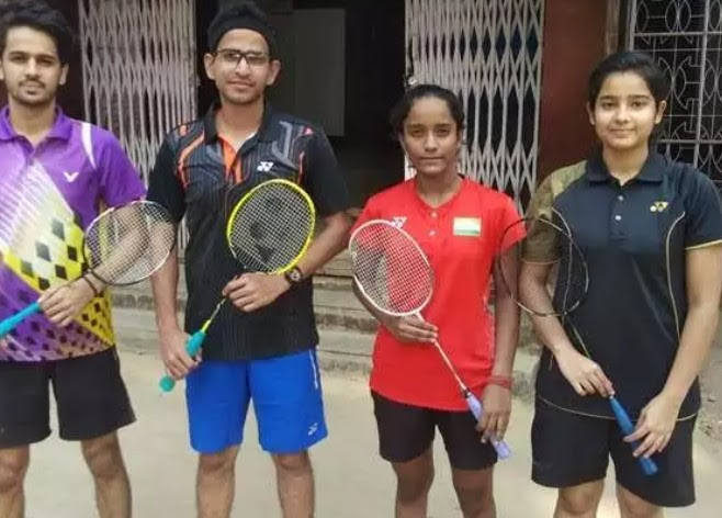 Aditya Yadav (in red) with her teammates