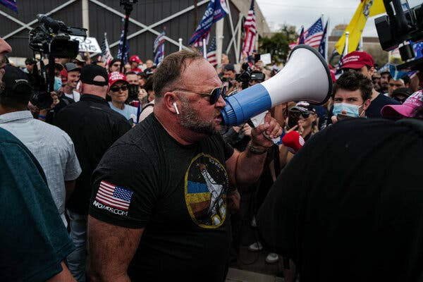 Alex Jones addressed Trump supporters at the Maricopa County Recorder’s office in Phoenix in 2020. Mr. Jones has spread conspiracy theories about the 2020 election as well as mass shootings.