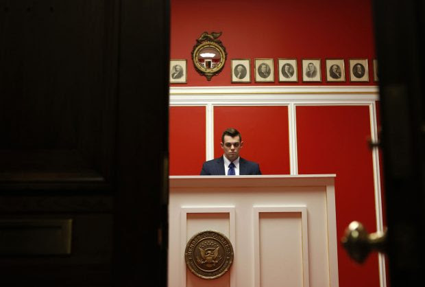 A staff member works at the office of Representative Aaron Schock (R-IL) on Capitol Hill in Washington March 17, 2015. Schock is resigning from Congress, U.S. House Speaker John Boehner said on Tuesday. Schock's resignation follows news reports that raised questions about his use of taxpayer dollars. He did not notify any House Republican leaders before making his decision, a House Republican aide said. REUTERS/Yuri Gripas (UNITED STATES - Tags: POLITICS) - RTR4TQUB