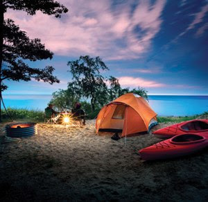 Beautiful waterfront campsites, like this one at Port Crescent State Park, are available now. Make your reservation today!