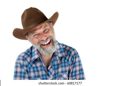 Cheerful portrait of a smiling cowboy