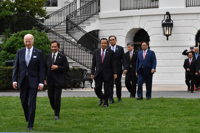 U.S. President Joe Biden (L) and leaders from the Association of Southeast Asian Nations (ASEAN) arrive for a group photo on the South Lawn of the White House in Washington, DC, May 12, 2022. Credit: AFP.