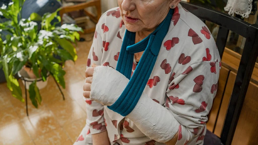 A person wearing a sling.