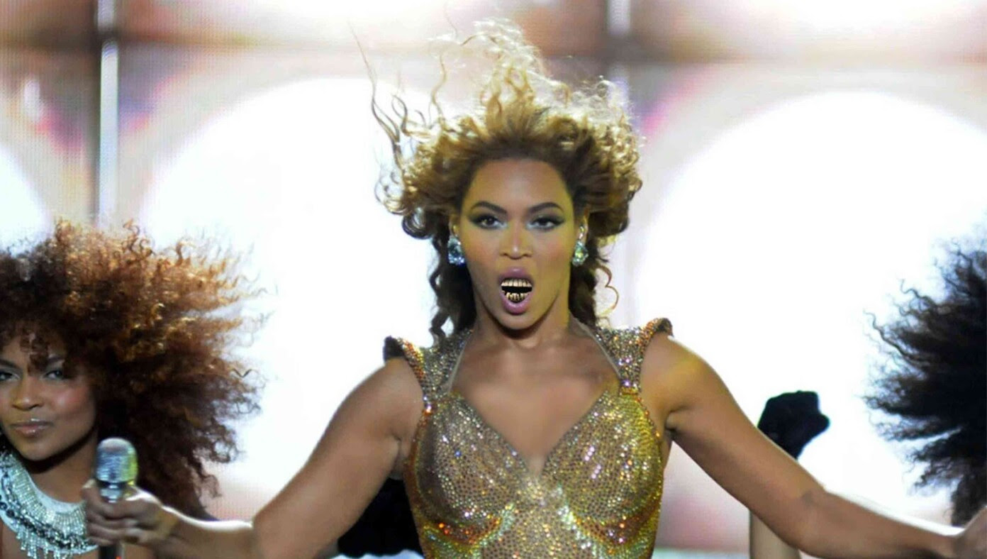 Not To Be Outdone By Lizzo, Beyoncé Performs Concert Wearing George Washington's Teeth