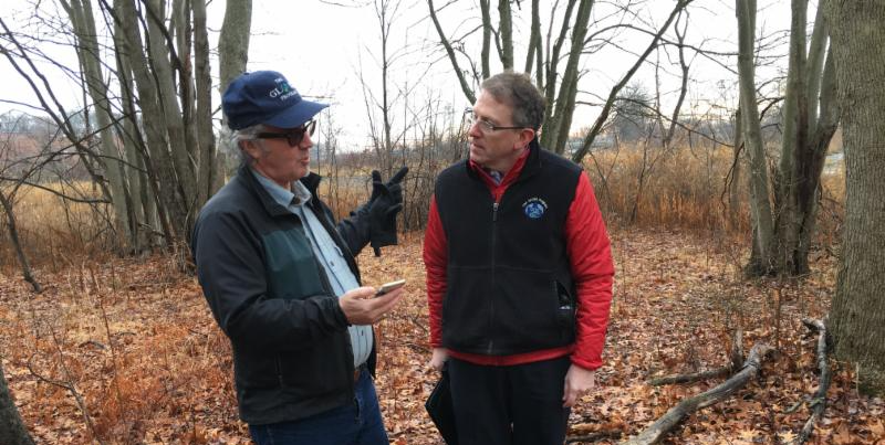 Dr. Tony Murphy and Scott Graves discussing potential field study.