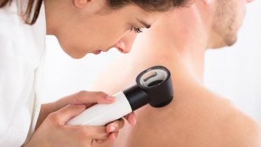Doctor Examining Skin