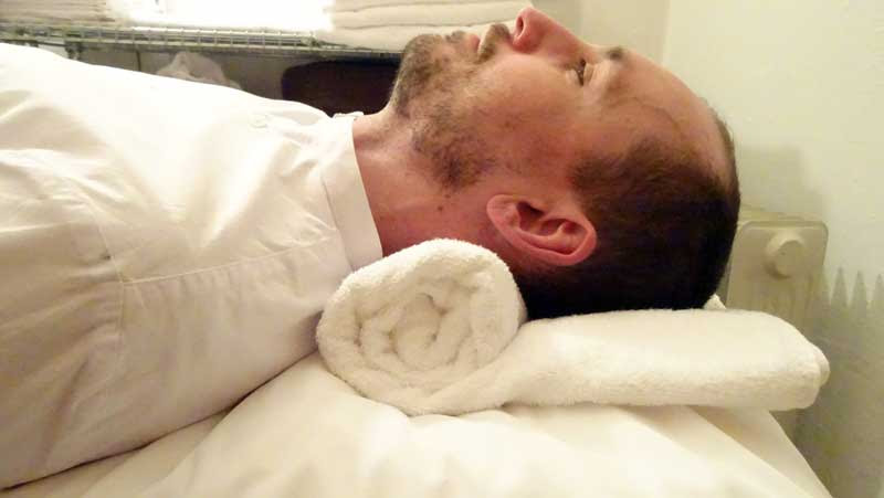 Sleeping with a rolled towel sales under neck