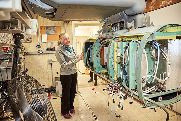 Robin Bell stands with the Ice Pod in her offices at Lamont Observatory