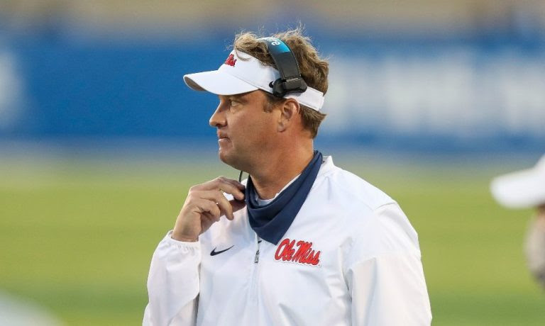 Lane Kiffin watches a play during Ole Miss game against Kentucky