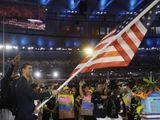 Michael Phelps carries the flag of the United States during the opening ceremony for the 2016 Summer Olympics in Rio de Janeiro, Brazil, Friday, Aug. 5, 2016. (AP Photo/David J. Phillip) ** FILE **