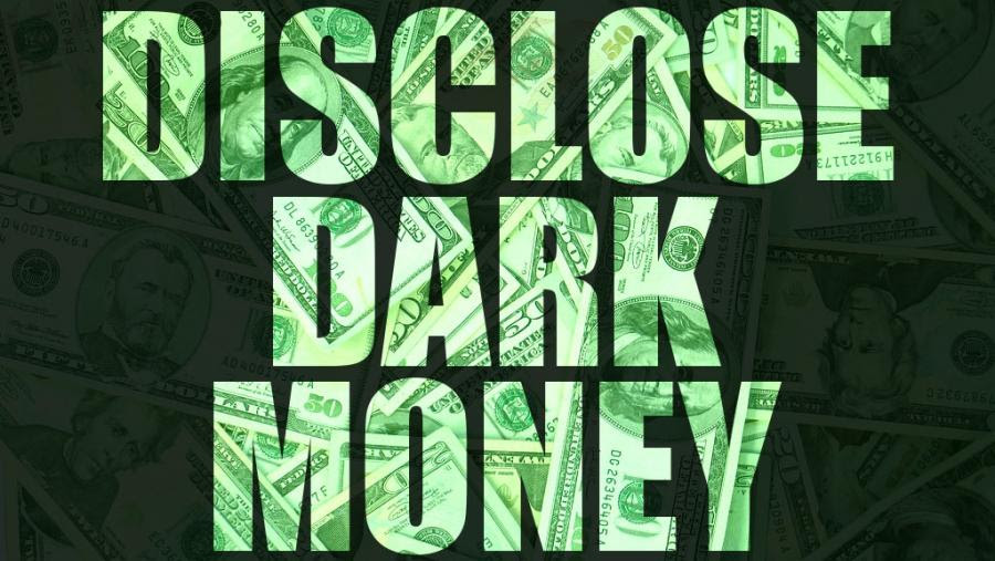 Sign saying disclose dark money