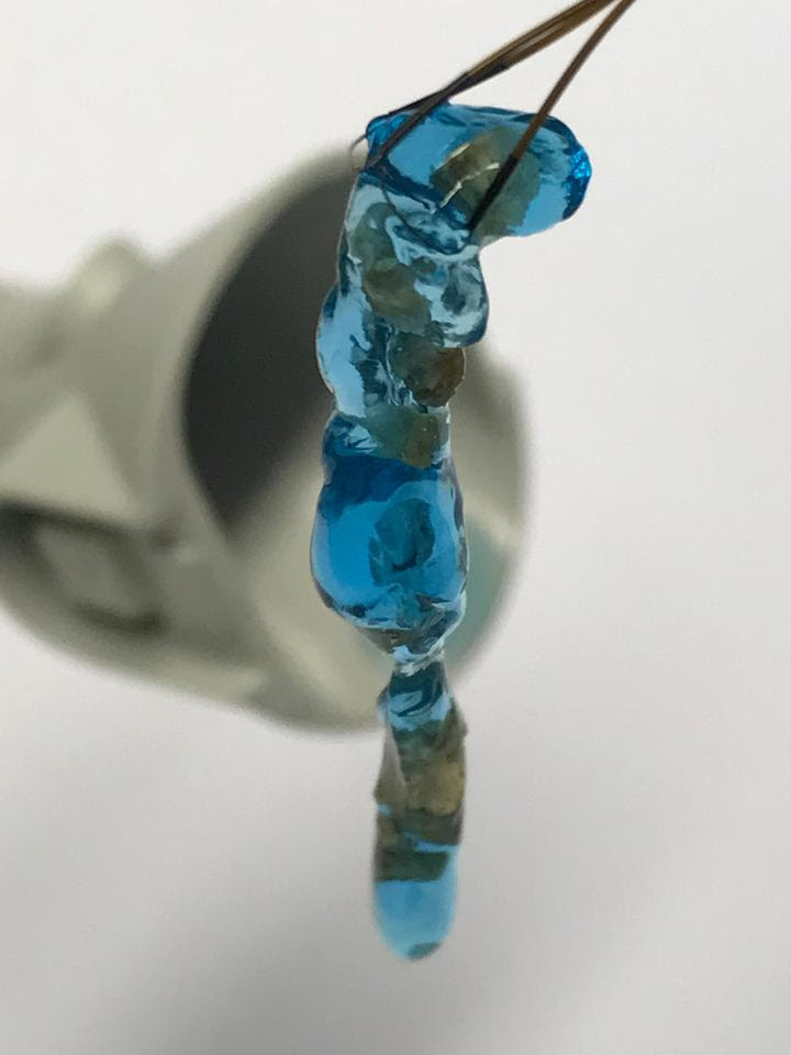 A piece of the hydrogel with encapsulated kidney stone fragments, following removal from the kidney