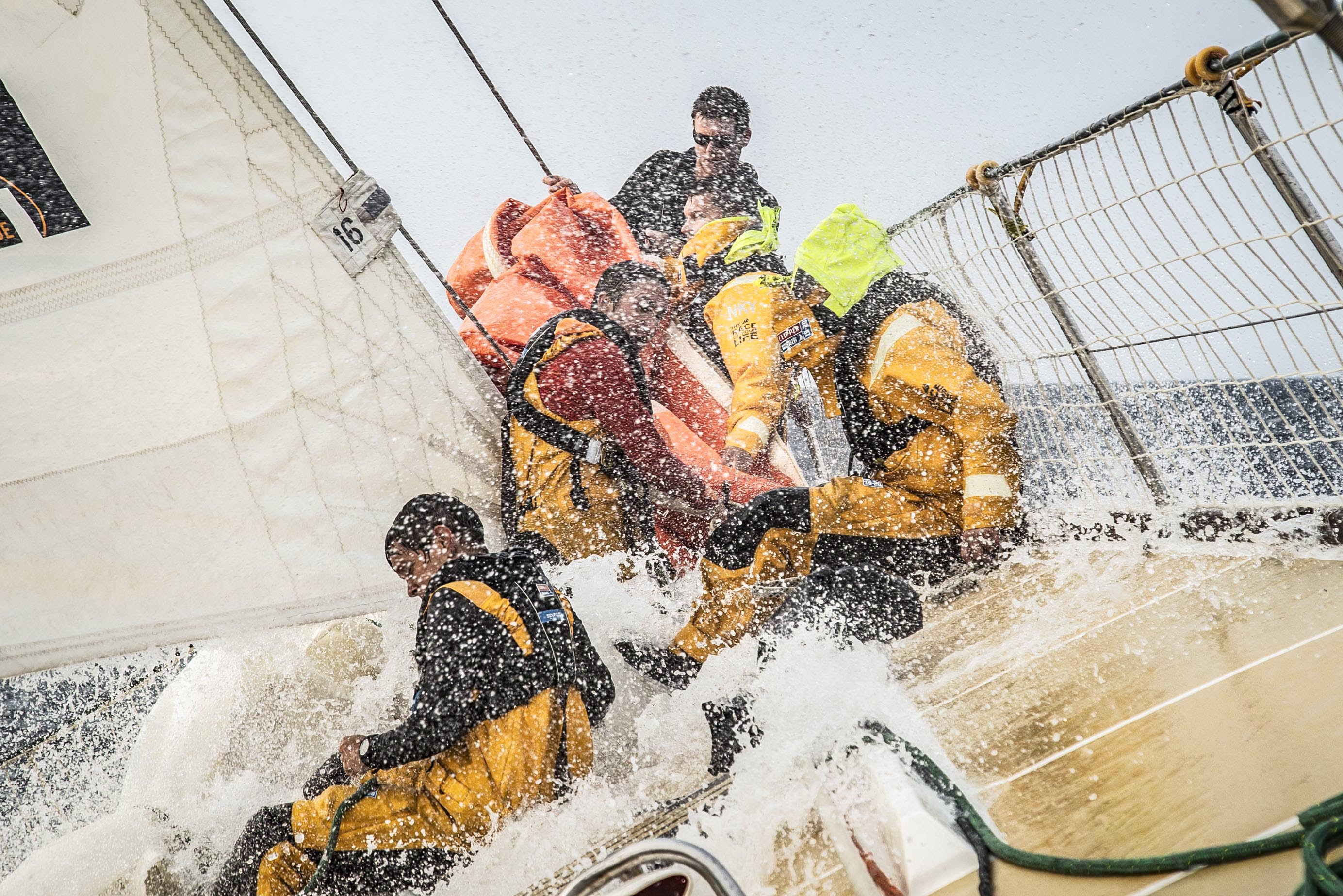 OBR1 CV26 crew hoisting storm jib, big splash.jpg