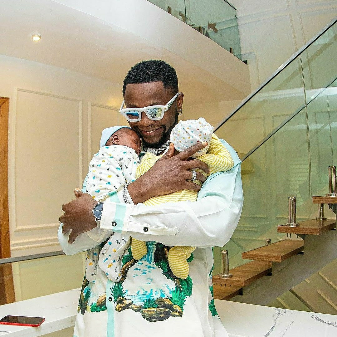 Kizz Daniel reveals he welcomed triplets but lost one as he gifts his newborn sons luxury apartments each (photos)
