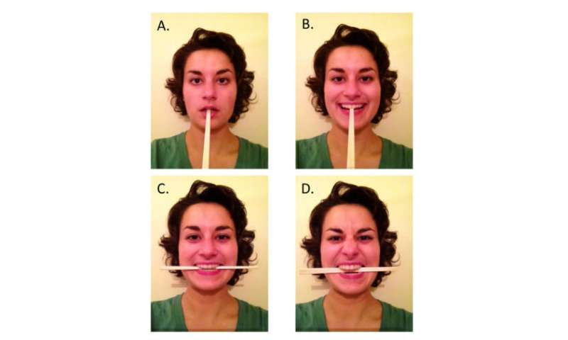 Smiling sincerely or grimacing can significantly reduce the pain of needle injection