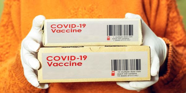 Two boxes of a COVID-19 vaccine