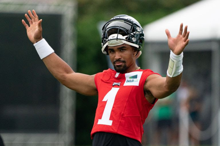 Jalen Hurts (#1) celebrates a touchdown in Eagles training camp for 2022