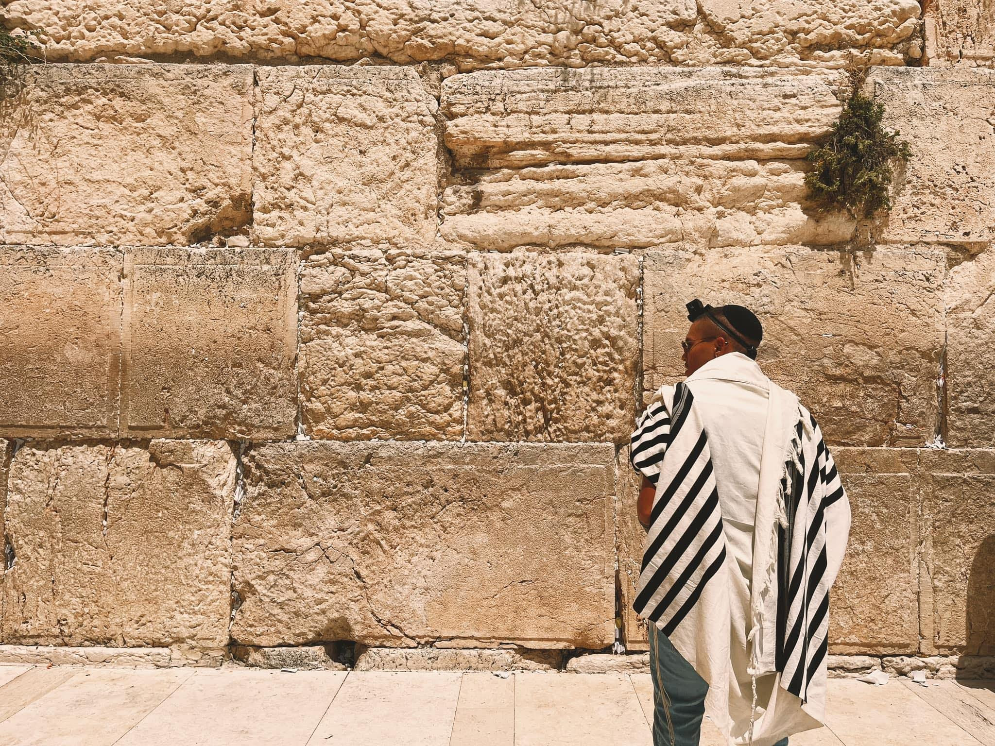 May be an image of one or more people, people standing and outdoors