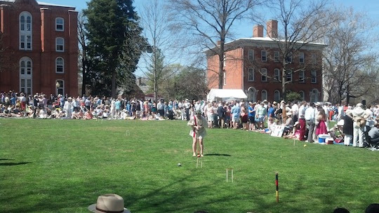 A St. John's croquet player lines up her shot / CJ Ciaramella