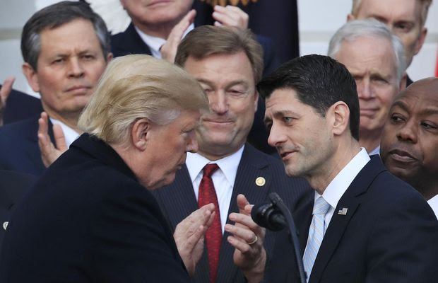 President Donald Trump shakes hands with House Speaker Paul Ryan of Wis., during an event to acknowledge the final passage of tax overhaul legislation by Congress on the South Lawn of White House in Washington, Wednesday, Dec. 20, 2017. (AP Photo/Manuel Balce Ceneta) ** FILE **