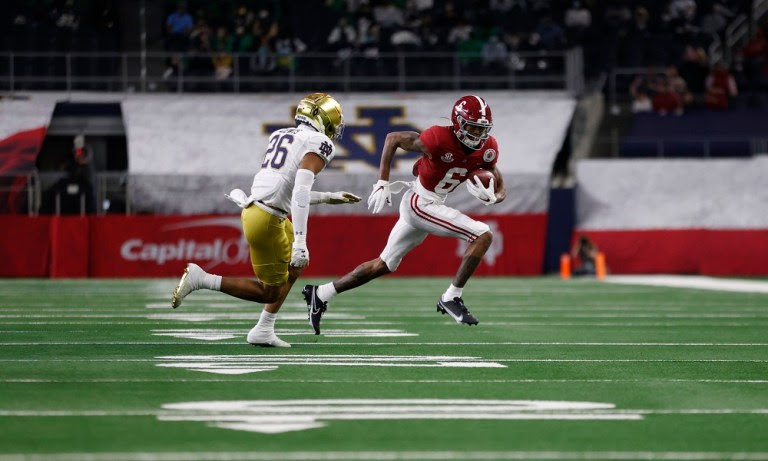 Alabama wide receiver DeVonta Smith runs with the football against Notre Dame in the Rose Bowl