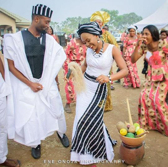 Tiv couple in traditional attire on wedding day [Poontoe] 