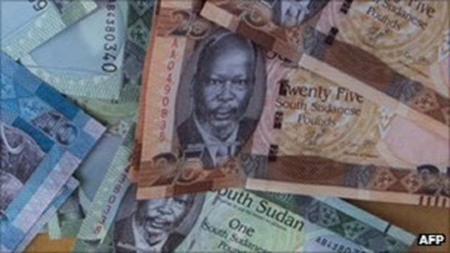 Freshly-minted notes of the new South Sudan pound pay homage to John Garang