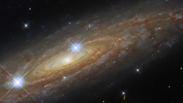 Hubble capta fotografia de galáxia espiral a 230 milhões de anos-luz