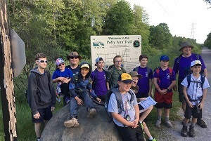 A Boy Scout troop takes a rest along a stretch of the Iron Belle Trail