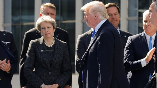 Trump walks past NATO leaders at the alliance's new headquarters in Brussels on May 25. (Jonathan Ernst/Reuters)