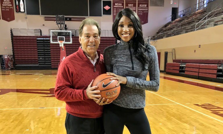 ESPN's Maria Taylor playing basketball with Alabama head coach, Nick Saban