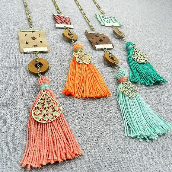 Image result for Chic bracelets and bright coloured tassel earrings