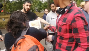 Video from UK: Muslim YouTuber Ali Dawah Throws to the Ground Christian Woman Who Criticized Islam