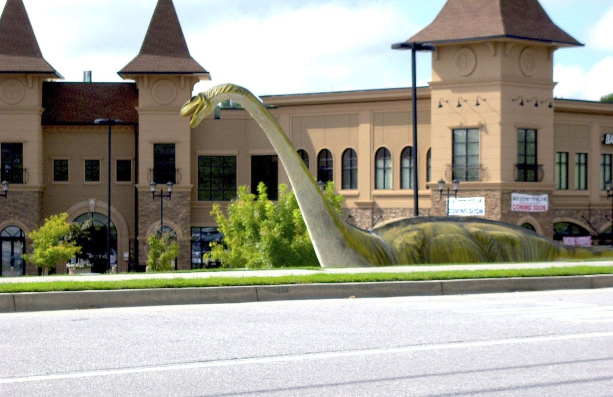 commissioners accept donation of dinosaur statues for