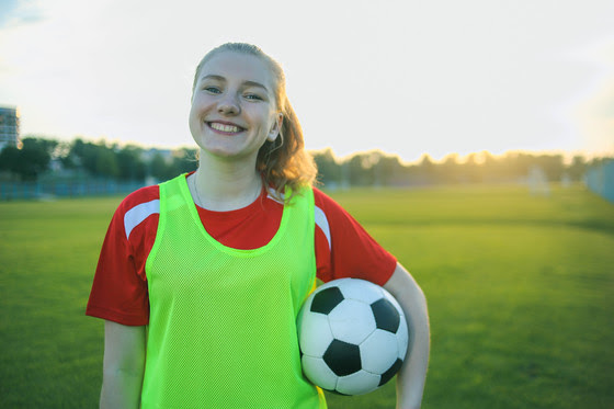 girl in soccer field