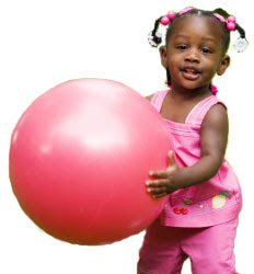 2 year old playing with big ball