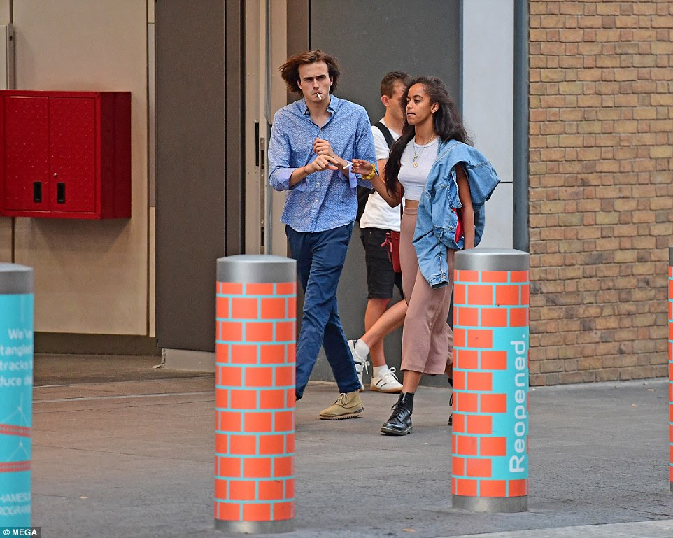 They were later seen walking down a London street, both puffing away on cigarettes
