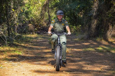 Pedego bike and rider on on a trail