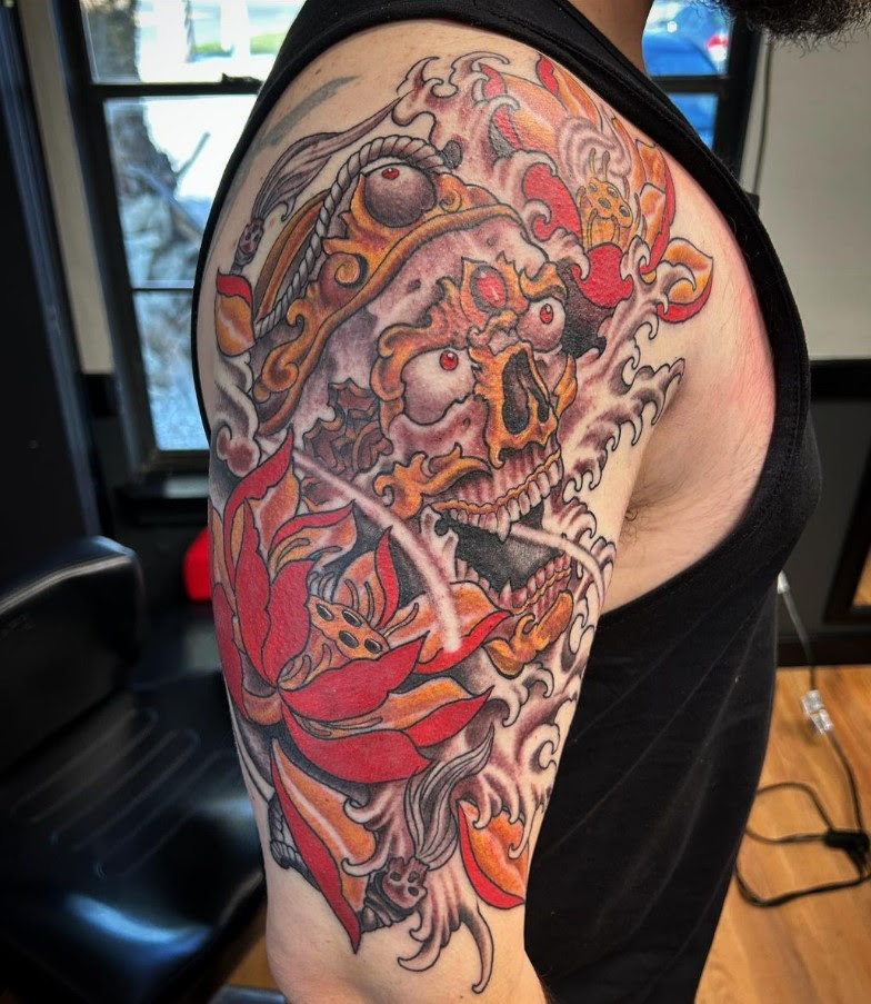 Tibetan Skull and Lotus Flower Tattoo By Mitch Teckman
